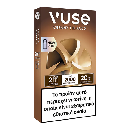Ένα κουτί Vuse Pods - Creamy Tobacco της Vuse, με χρυσό και καφέ σχέδιο, περιέχει 20 mg/ml νικοτίνης, προσφέρει 2000 ρουφηξιές και εμφανίζει μια ελληνική προειδοποίηση για την εθιστική φύση της νικοτίνης.